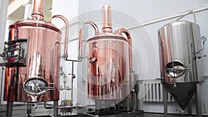 Copper tuns for brewing at a brewery