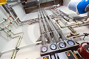 Copper valves, stainless ball valves, detectors of water pressure and plastic pipes of central heating system and water