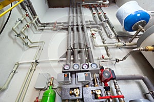 Copper valves, stainless ball valves, detectors of water pressure and plastic pipes of central heating system and water