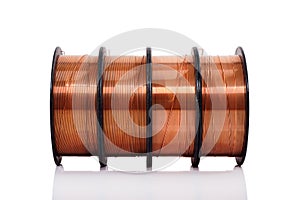 Copper welding wire in spools isolated