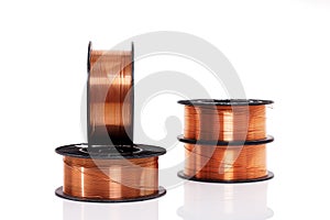 Copper welding wire in spools isolated