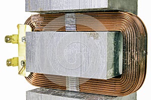 Copper winding used in the electromagnet. Device for changing the value of the magnetic field