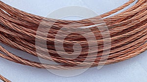 Copper wire close-up on a white background.