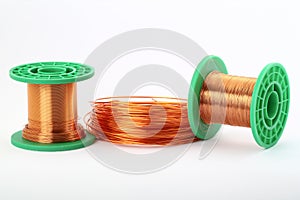 Copper wire on rolls, on white