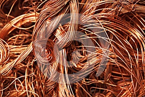 Copper wire texture background in full screen. Scrap of non-ferrous metals.