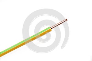 Copper wire with yellow and green markings on a white background
