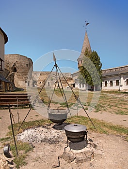 Coppers in courtyard of ancient castle