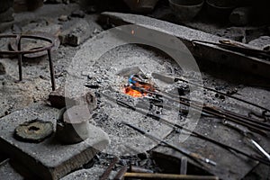 Coppersmith workshop and hand made copper things, Lahich, Azerbaijan. Interior of coppersmith workshop in the village.