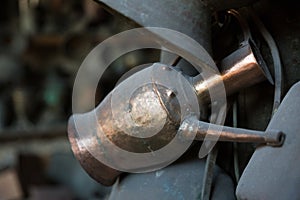 Coppersmith workshop and hand made copper things, Lahich, Azerbaijan. Interior of coppersmith workshop in the village.