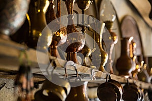 Coppersmith workshop and hand made copper things, Lahich, Azerbaijan. Interior of coppersmith workshop in the village.