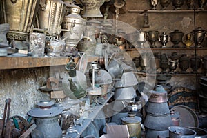 Coppersmith workshop and hand made copper things, Lahich, Azerbaijan. Interior of coppersmith workshop in the village.