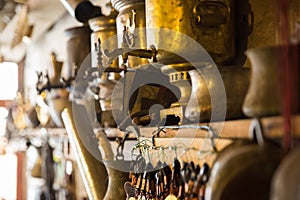 Coppersmith workshop and hand made copper things, Lahich, Azerbaijan. Interior of coppersmith workshop in the village.