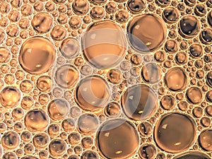 Coppery Colored Oil-and-Water Bubbles