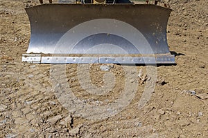 Copy space below a bulldozer blade