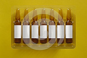 Copy space header title of medicine pharma drug images. Seven ampules with empty place to overlay letters of inscription