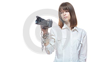 Copyright. The camera is chained to the photographer's hand. The concept of protecting the photographer from theft