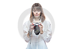 Copyright. The camera is chained to the photographer's hand. The concept of protecting the photographer from theft