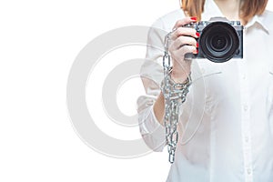 Copyright. The camera is chained to the photographer& x27;s hand. The concept of protecting the photographer from theft