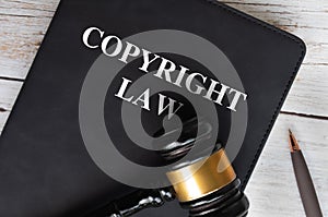 Copyright Law book with gavel background. Law concept