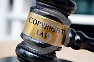 Copyright law text engraved on gavel. Probate Law and Legal concept