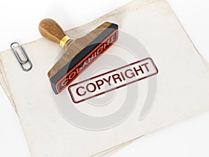 Copyright stamp standing on documents. 3D illustration