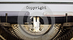 Copyright symbol. The word `Copyright` typed on retro typewriter. Business, copyright concept. Beautiful background