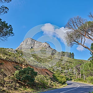 Copyspace with a mountain pass along Lions Head in Cape Town, South Africa against a blue sky background. Breathtaking