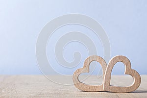 Copyspace view two wood hearts simbol of love