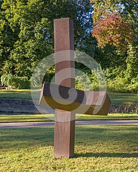 Cor-ten steel sculpture titled Three-Up by Clement Meadmore in the gardens of the Philbrook Museum of Art in Tulsa, Oklahoma.