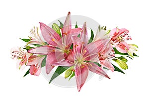 Coral alstroemeria, lily flowers, buds and green leaves in a floral arrangement isolated