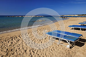 Coral Bay beach and lounge chairs in Cyprus