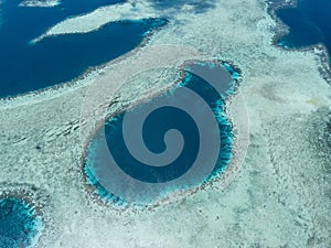 Aerial View of Blue Hole and Reefs in Raja Ampat photo