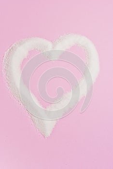 CorazÃÂ³n de azucar, fondo rosa. photo