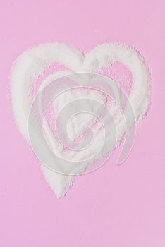 CorazÃÂ³n de azucar, fondo rosa. photo