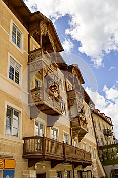 Corbelled facade on an apartment building. in northern Italy photo