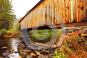 Corbin covered bridge over Sugar River in Newport, New Hampshire photo
