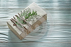 Corded handmade gift box with thuya branch horizontal view