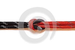 Corded knot on a white background. Isolated knot