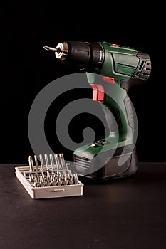 Cordless drill driver isolated on the black background