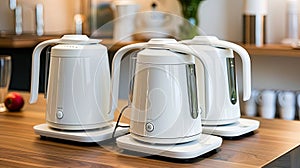 cordless electric kettles with detachable bases and ergonomic designs, showcasing their portability and ease of use in photo