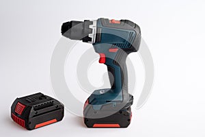 Cordless Power Drill with Battery on White Background