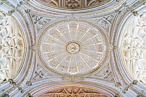 Ornated dome in the Mezquita Cathedral of Cordoba. Andalusia, Spain. July-03-2019 photo