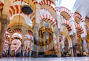 Arches and Columns Inside the Cathedral Mosque, La Mezquita de Cordoba in Andalusia, Spain photo