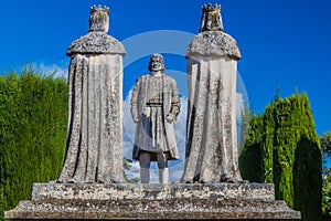 CORDOBA, SPAIN - NOVEMBER 5, 2017: Statue of Christian kings Ferdinand and Isabella and Christopher Columbus in Alcazar de los