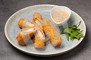 Cordon bleu appetizer with cheese and deep-fried ham