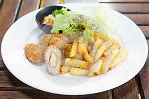 Cordon bleu and french fries served