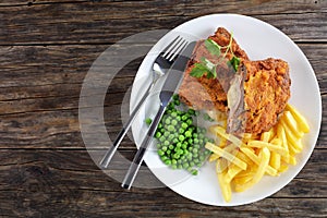 Cordon Blue with French fries, green peas