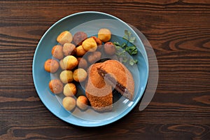 Cordon blue with garnish potato balls on the plate