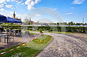 Cordoned off beer garden at Schwerin Castle. Concept to stop or slow down the spread of the COVID-19 Conora virus