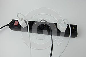 Cords for charging a phone connected